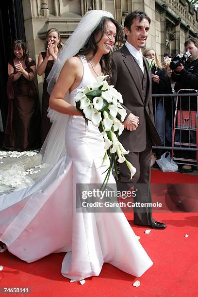 Mr and Mrs Neville leave Manchester Cathedral after their wedding on June 16, 2007 in Manchester, England.