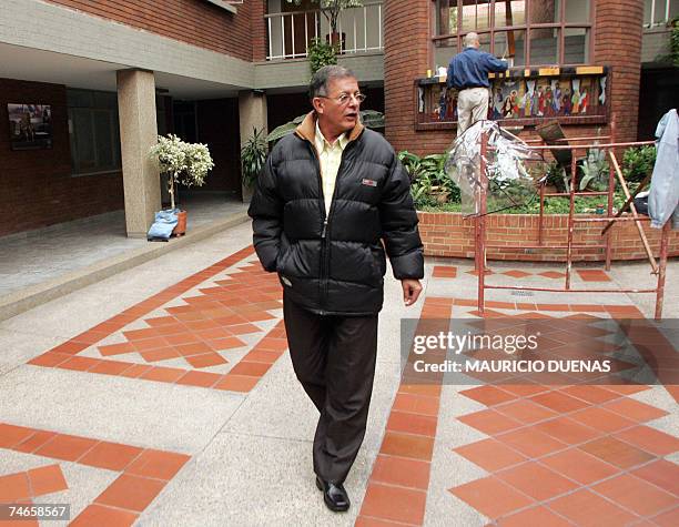 Revolutionary Armed Forces of Colombia rebel Rodrigo Granda, known as the armed movement's "foreign minister", walks inside the compound after a...