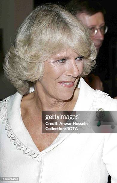 Duchess of Cornwall wearing a brooch which was once part of one of Diana's necklaces, attends the film premiere of "The History Boys" at the Odeon...