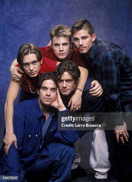 Robbie Williams, Mark Owen, Gary Barlow, Jason Orange and Howard Donald of Take That at the Studio Session in New York City, New York