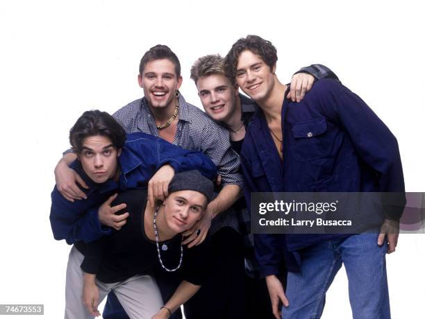 Mark Owen, Robbie Williams, Jason Orange, Gary Barlow and Howard Donald of Take That at the Studio Session in New York City, New York