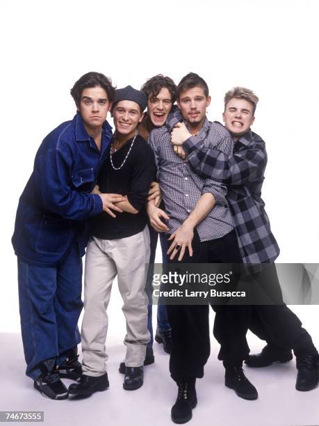 Robbie Williams, Mark Owen, Howard Donald, Jason Orange and Gary Barlow of Take That at the Studio Session in New York City, New York