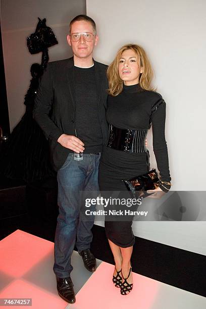 Giles Deacon and Eva Mendes at the Harvey Nichols in London, United Kingdom.