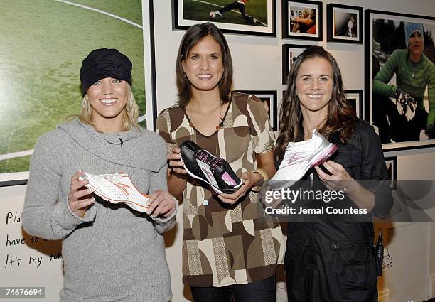 Hope Solo, Logan Tom and Brandi Chastain with the new Nike Tailwind Shoes at the Lotus Space in New York City, New York