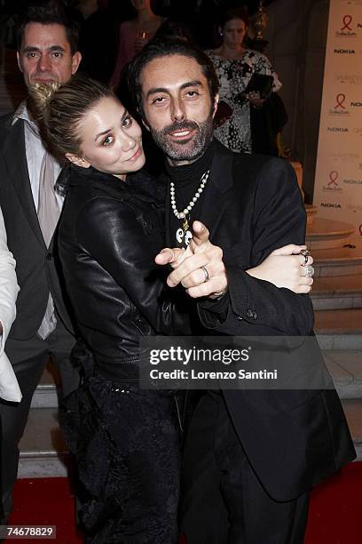 Ashley Olsen and Giambattista Valli at the Salon France-Ameriques in Paris, France.