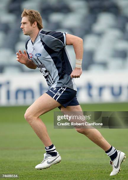 Tom Lonergan of the Cats runs during the pre game warm up prior to the round 10 VFL match between the Geelong Cats and the Tasmania Devils at Skilled...