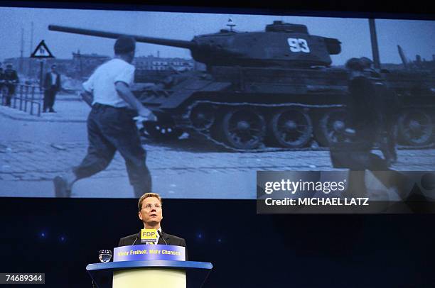 Guido Westerwelle, chairman of Germany's free democratic FDP party, speaks to the delegates during the FDP's party conference in the southern Germany...