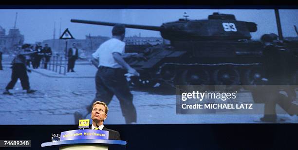 Guido Westerwelle, chairman of Germany's free democratic FDP party, speaks to the delegates during the FDP's party conference in the southern Germany...