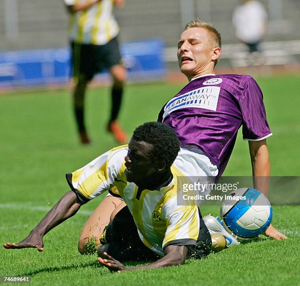 June 17: Berlin's Dennis Osandchenka and Dortmund's Victor Hounyor Houschba fight for the ball during the B Juniors match between Tennis Borussia...