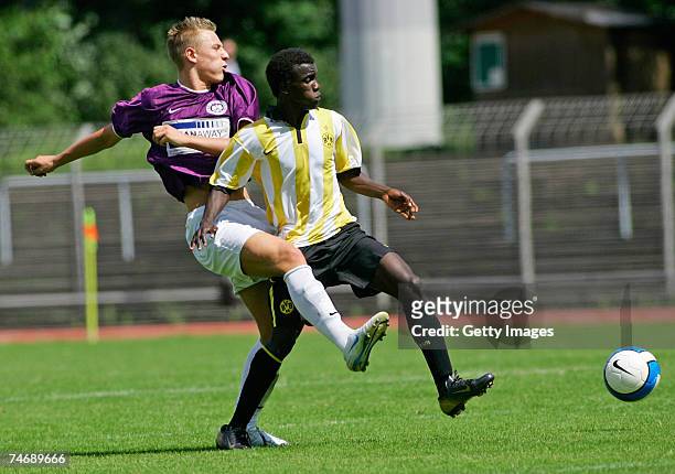 June 17: Berlin's Dennis Osandchenka and Dortmund's Victor Hounyor Houschba fight for the ball during the B Juniors match between Tennis Borussia...