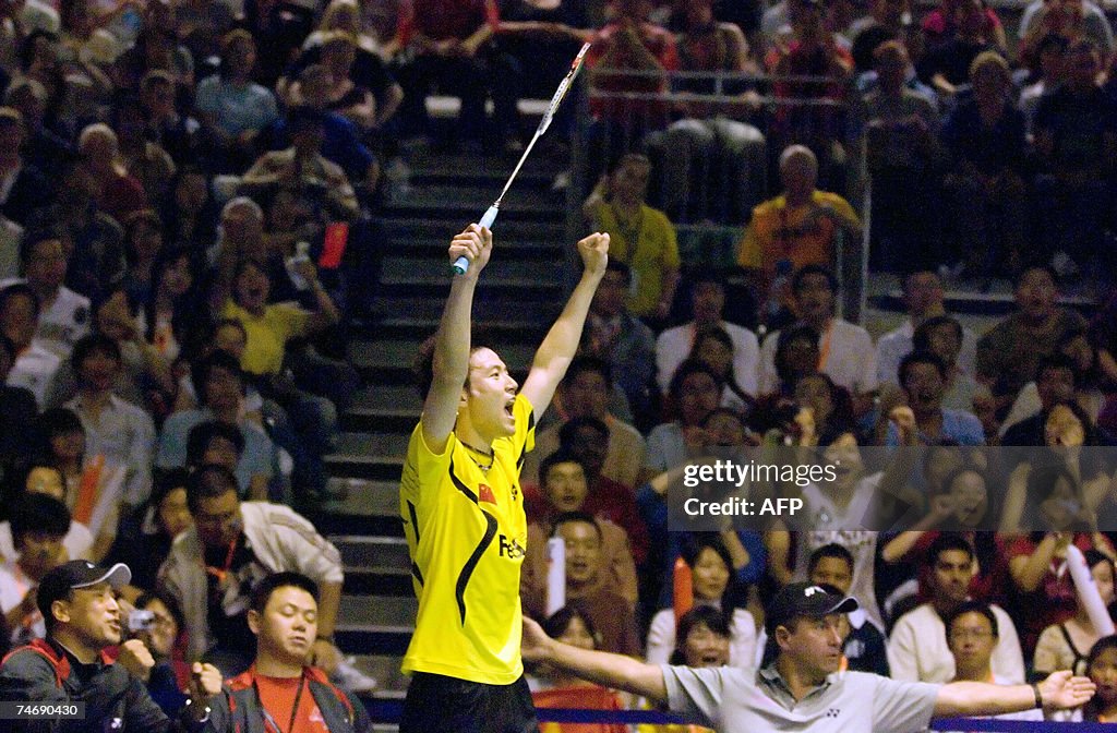 Chinese Badminton Player Cai Yun Celebrates Winning The Men s Doubles chinese-badminton-player-cai-yun-celebrates-winning-the-men-s-doubles