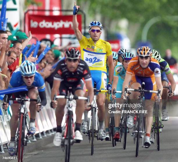 French Christophe Moreau celebrates at the end of the 7th and last stage of the 60th Dauphine Libere cycling race, between Valloire and Annecy, 17...