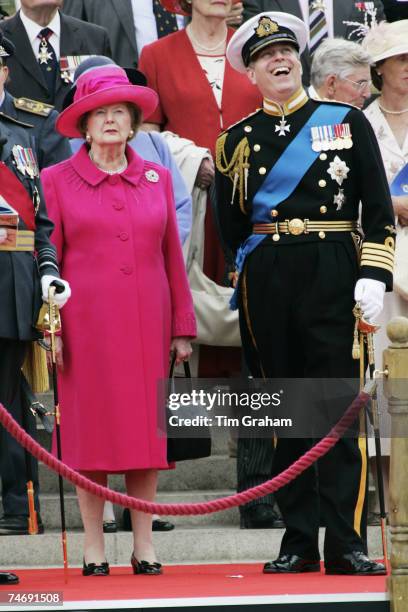 Prince Andrew, Duke of York and Baroness Thatcher watch a military flypast over Buckingham Palace after a parade for Falkland Veterans on June 17,...