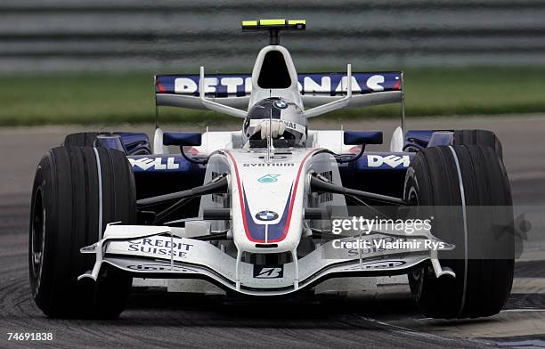 Sebastian Vettel of Germany and BMW Sauber races during the F1 Grand Prix of USA at the Indianapolis Motor Speedway on June 17, 2007 in Indianapolis,...