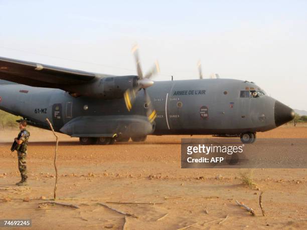 French Airforce transport plane loaded with humanitarian aid taxis at an airstrip just outside Goz Beida, which is 90 kilometres from the Sudanese...