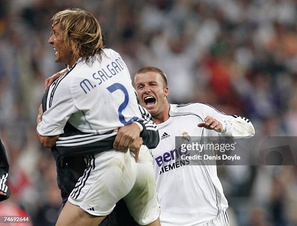 David Beckham and Michel Salgado of Real Madrid celebrates defeating Mallorca during the Primera Liga match at the Santiago Bernabeu stadium on June...