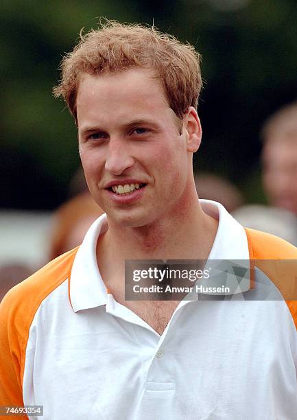 Prince William smiles as he plays a charity polo match for Apes Hill Club Barbados against Churchill Retirement Living for the Calcot Manor Hotel Cup...