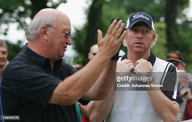 Boris Becker and Alois Hartl chat during the opening of Hartl Golf Resort on June 18 in Penning, Germany.