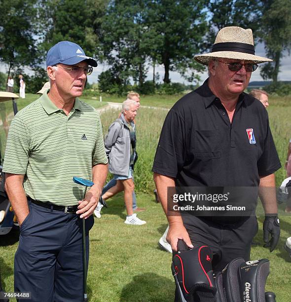Franz Beckenbauer and Alois Hartl chat during the opening of Hartl Golf Resort on June 18 in Penning, Germany.