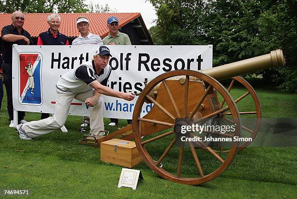 Former German tennis legend Boris Becker opens the Hartl Golf Resort by firing a cannon shot, with Alois Hartl, Hans-Dieter Cleven, Bernhard Langer...