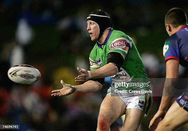 Alan Tongue of the Raiders passes the ball during the round 14 NRL match between the Newcastle Knights and the Canberra Raiders at EnergyAustralia...