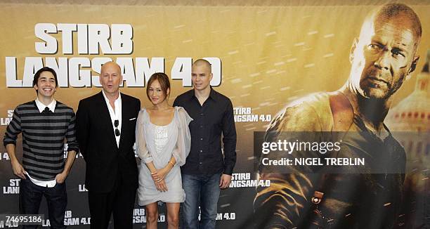 Actor Bruce Willis poses for photographers 18 June 2007 during a photo call for his latest film ?Live Free or Die Hard? the 4th of the ?Die Hard?...