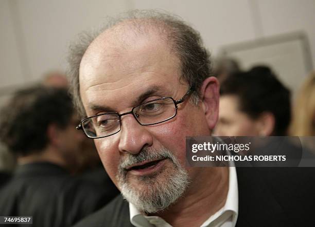 New York, UNITED STATES: In this file photo taken, 23 April 2007, author Salman Rushdie chats with attendees of the opening night of the PEN World...