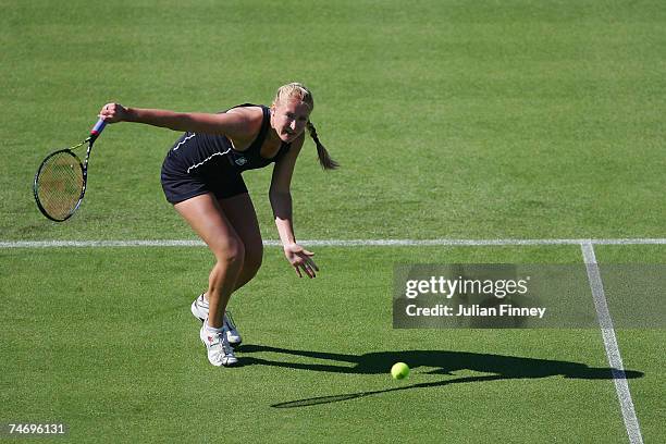 Elena Baltacha of Great Britain plays a backhand in her match against Julia Schruff of Germany during the International Women's Open Tennis...