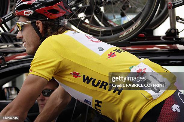 Overall leader Switzerland's Fabian Cancellara has his number 13 reversed for superstition reasons prior to the start of the 71th Tour de Suisse UCI...