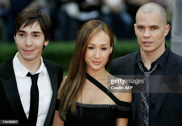 Actors Justin Long, Maggie Q. And Timothy Olyphant pose as they arrive for the German Premiere for his latest film ?Live Free or Die Hard,? the 4th...