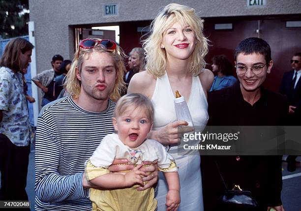 Kurt Cobain of Nirvana with wife Courtney Love and daughter Frances Bean Cobain, and Sinead O'Connor at the Universal Ampitheater in Universal City,...