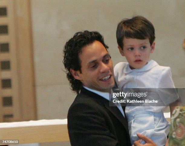 Marc Anthony and his son at the St. Agatha Church in Miami, Florida