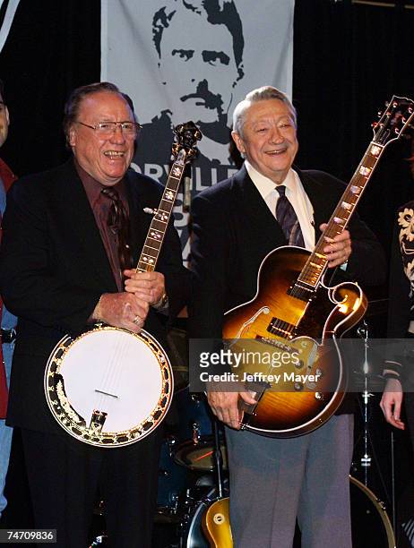 Earl Scruggs and Scotty Moore with a gift banjo and guitar from Gibson. At the The Knitting Factory in Los Angeles, California