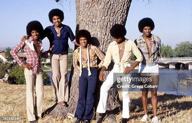 Michael Jackson, Tito Jackson, Marlon Jackson, Randy Jackson and Jackie Jackson of The Jacksons pose during a publicity photo shoot after the band...