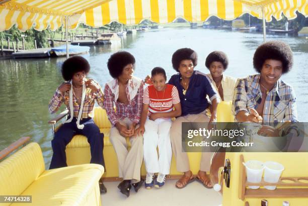 Janet Jackson with her brothers Marlon Jackson, Michael Jackson, Tito Jackson, Randy Jackson and Jackie Jackson of The Jacksons pose during a...