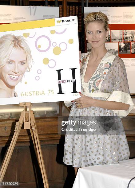 Heidi Klum with her new postage stamp at the Vienna City Library in Vienna, Austria.