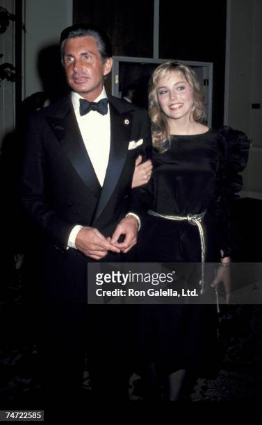 George Hamilton and Sharon Stone at the Beverly Hilton Hotel in Beverly Hills, California