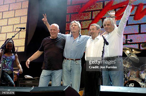 David Gilmour, Roger Waters, Nick Mason and Richard Wright of Pink Floyd after their reunion performance at Live 8 in London's Hyde Park, 2 July 2005...