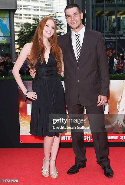 Model Barbara Meier, winner of Germany's Next Topmodel, and friend Sebastian attend the German premiere to Die Hard 4.0 at the Sony Center CineStar...