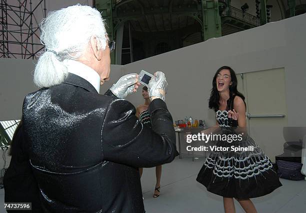 Karl Lagerfeld and Mariacarla Boscono backstage at Chanel Spring/Summer 2006 at the Grand Palais in Paris, France.