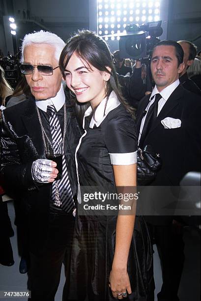 Karl Lagerfeld, Camilla Belle, Body Guard at the Front Row Grand Palais in Paris, France.