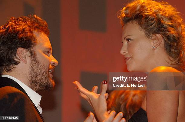 Peter Sarsgaard and Charlize Theron at the Palm Springs Convention Center in Palm Springs, California