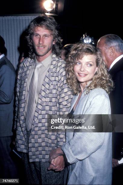 Peter Horton and Michelle Pfeiffer at the Samuel Goldwyn Theater in Beverly Hills, California