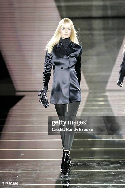 Model wearing Versace Autumn/Winter 2006 at the Piazza Affari in Milan, Italy.