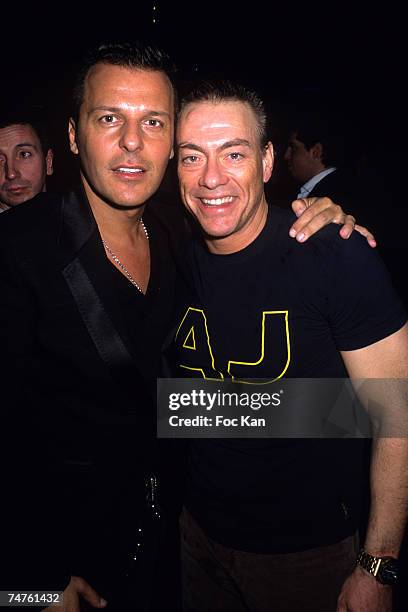 Jean Roch and Jean Claude Van Damme at the VIP Room Club in Paris, France.