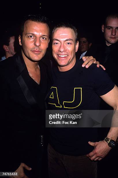 Jean Roch and Jean Claude Van Damme at the VIP Room Club in Paris, France.