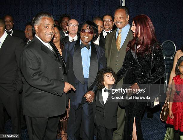 Al Sharpton, James Brown and son James Jr., Jesse Jackson and Tomi Rae Hynie at the Sheraton Hotel in New York City, New York