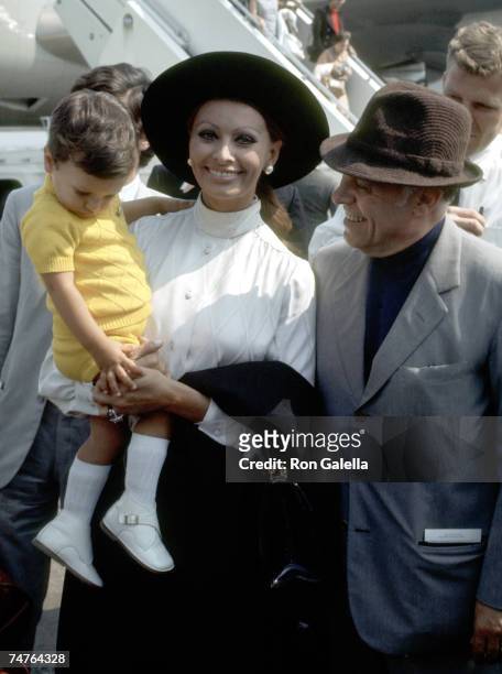 Sophia Loren, Carlo Ponti, and Son Carlo Ponti Jr. At the JFK International Airport in New York City, New York