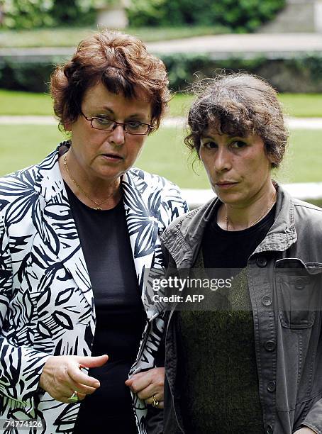 French minister for Housing and Urban Affairs Christine Boutin chats with her newly appointed junior minister for urban affairs Fadela Amara pose 19...