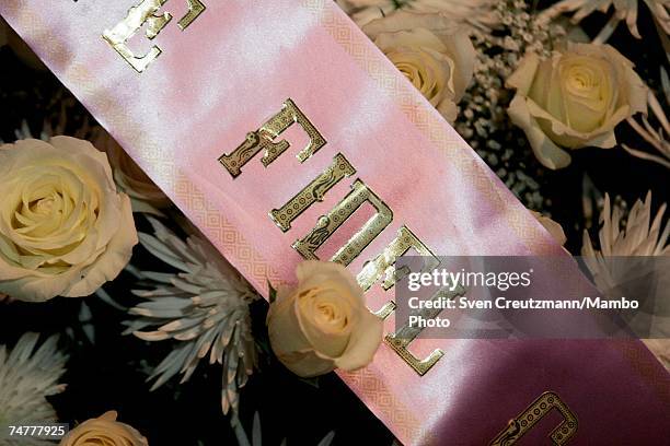 Wreath with the name of Fidel Castro is displayed near a memorial for Vilma Espin, wife of Cuba's acting President Raul Castro, is displayed in the...